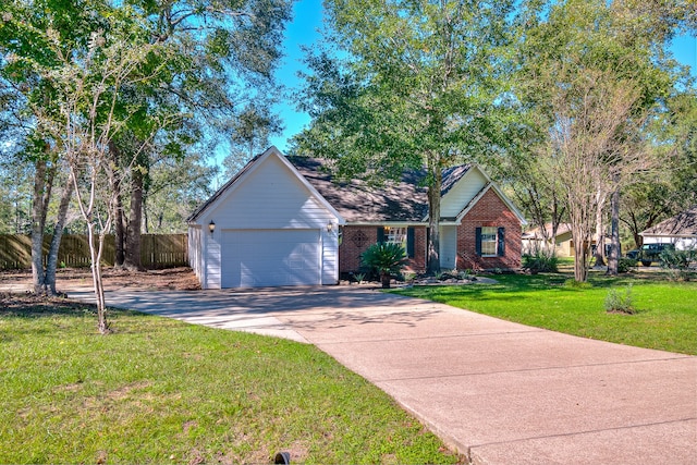 view of front of house featuring a garage and a front lawn