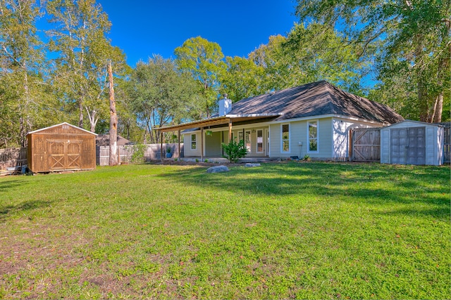 exterior space featuring a front lawn and a storage unit