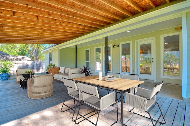 wooden deck featuring an outdoor hangout area