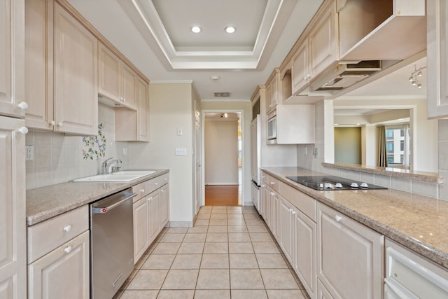 kitchen with light stone countertops, sink, stainless steel dishwasher, decorative backsplash, and black electric stovetop