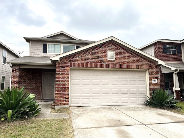 front facade with a garage