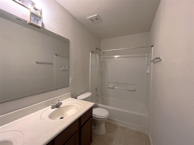 full bathroom featuring vanity, shower / bath combination with curtain, a textured ceiling, and toilet