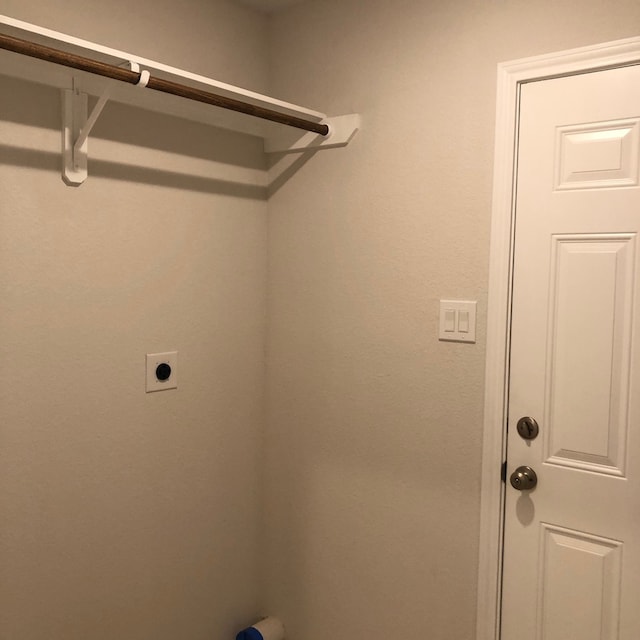 washroom with electric dryer hookup