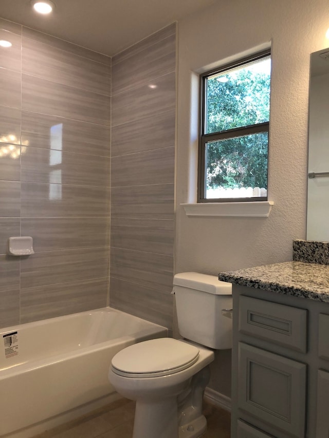 full bathroom featuring shower / washtub combination, vanity, and toilet