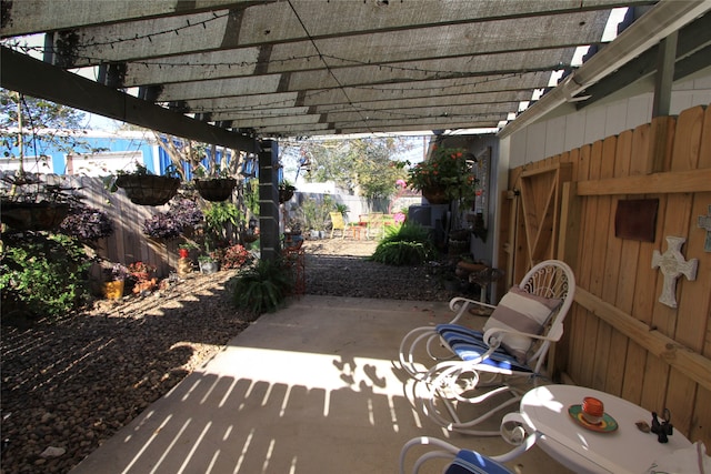 view of patio featuring a pergola