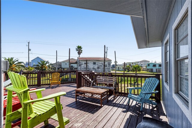 219 Fort Velasco Dr, Surfside Beach, TX 77541 - wooden deck with a residential view