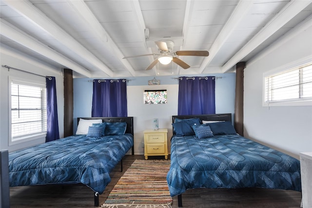 219 Fort Velasco Dr, Surfside Beach, TX 77541 - bedroom with dark wood finished floors, beamed ceiling, and a ceiling fan