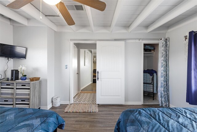 219 Fort Velasco Dr, Surfside Beach, TX 77541 - bedroom featuring beamed ceiling, wood finished floors, baseboards, ceiling fan, and a closet