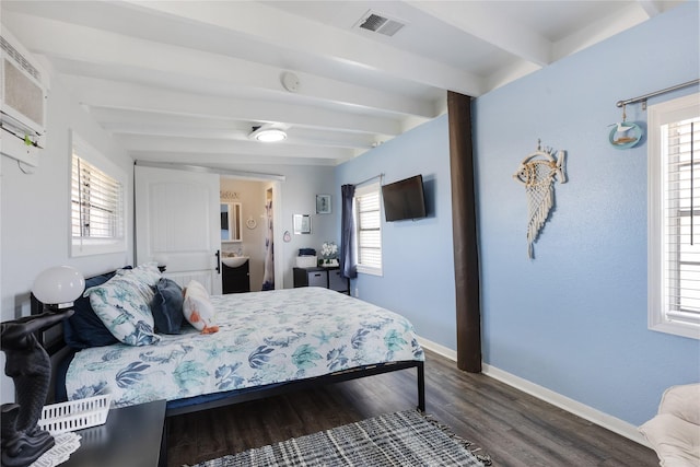 219 Fort Velasco Dr, Surfside Beach, TX 77541 - bedroom featuring beamed ceiling, dark wood-style floors, multiple windows, and baseboards