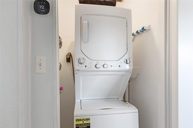219 Fort Velasco Dr, Surfside Beach, TX 77541 - laundry area featuring stacked washer / dryer