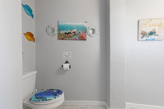 219 Fort Velasco Dr, Surfside Beach, TX 77541 - bathroom featuring toilet and baseboards
