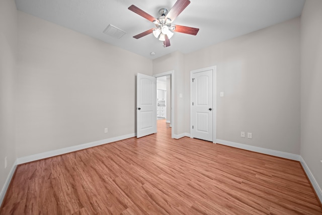 unfurnished bedroom featuring ceiling fan and light hardwood / wood-style floors