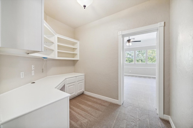 interior space featuring built in desk