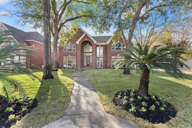 view of front of house with a front lawn