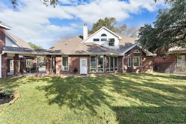 6627 Butler Oaks Ct, Spring, TX 77389 - rear view of house with brick siding, a chimney, and roof with shingles