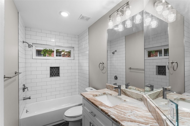 6627 Butler Oaks Ct, Spring, TX 77389 - full bath featuring toilet, washtub / shower combination, and vanity