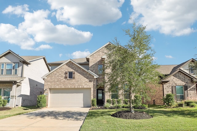 view of front of home with a garage and a front yard