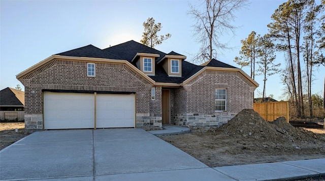 view of front property with a garage