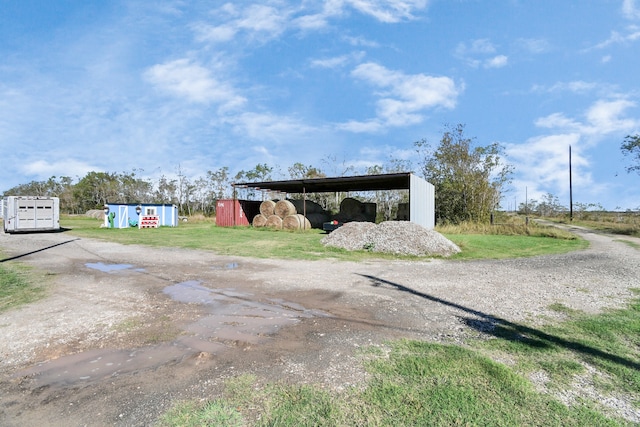 exterior space featuring a carport