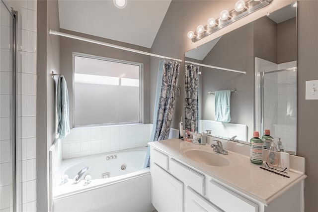 bathroom featuring vanity, plus walk in shower, and vaulted ceiling