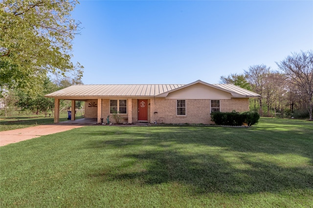 ranch-style home with a front yard and a carport