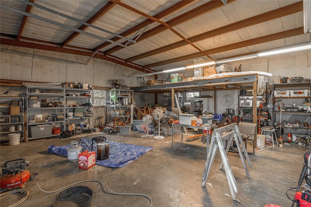 garage featuring a workshop area