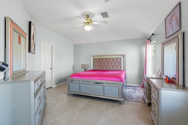 bedroom featuring ceiling fan and vaulted ceiling