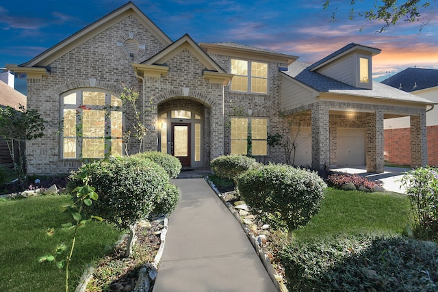 view of front of property with a garage