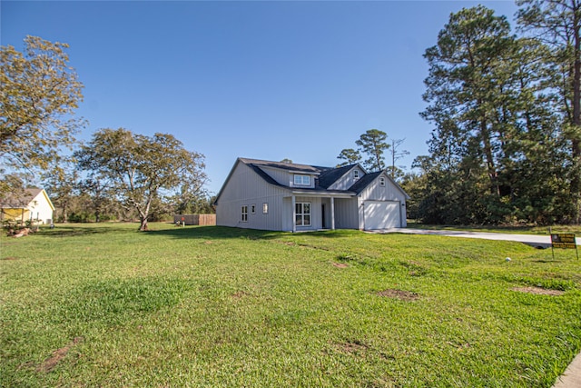 view of yard featuring a garage