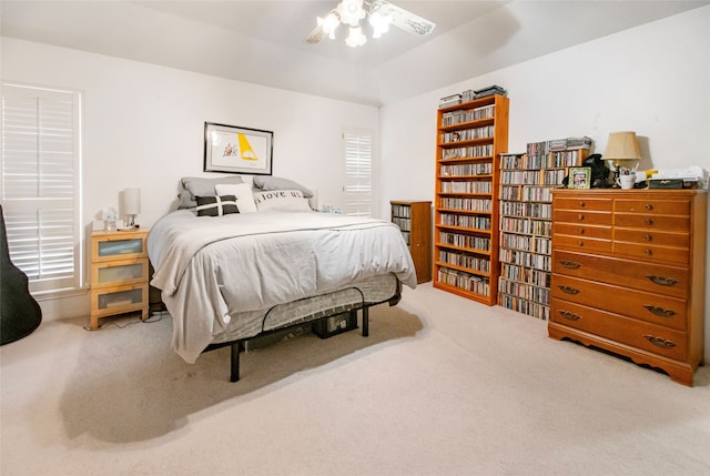 bedroom with ceiling fan and carpet