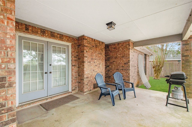 view of patio / terrace featuring french doors and a grill