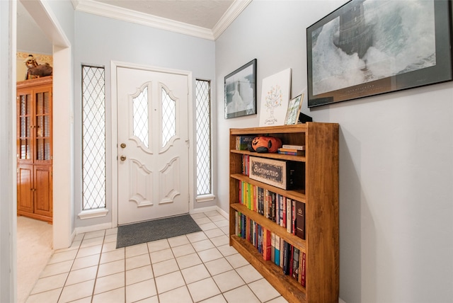 entryway with crown molding and light tile patterned flooring