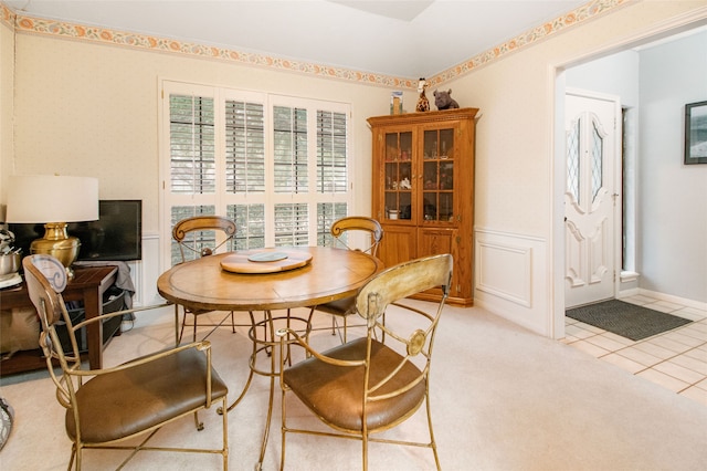 view of carpeted dining space