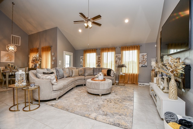 living room with ceiling fan, light tile patterned flooring, and high vaulted ceiling