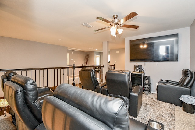 cinema featuring carpet and ceiling fan