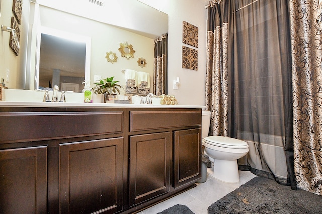 full bathroom with tile patterned floors, vanity, shower / bath combination with curtain, and toilet