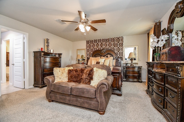 bedroom featuring ceiling fan and light carpet