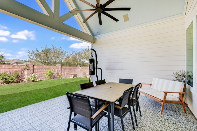 view of patio featuring ceiling fan