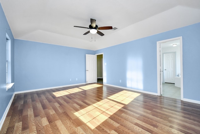 unfurnished room featuring ceiling fan and hardwood / wood-style floors