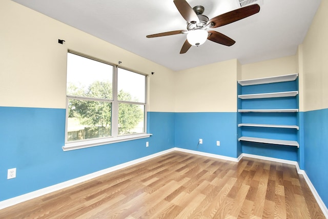 interior space with light hardwood / wood-style floors and ceiling fan