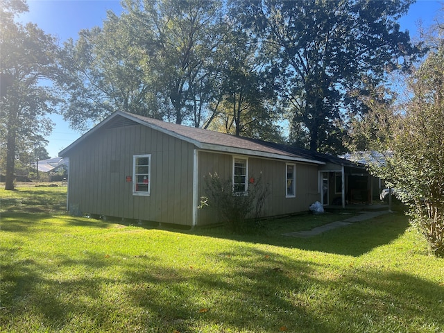 exterior space with a lawn