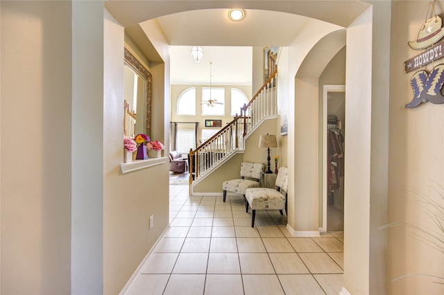 hall with light tile patterned flooring