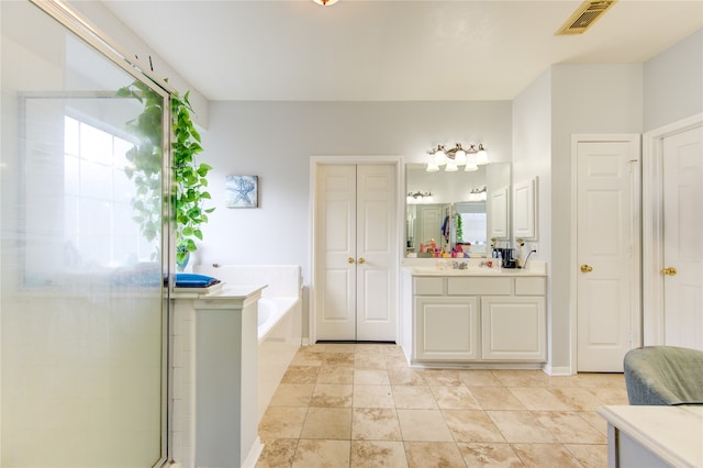 bathroom featuring plus walk in shower and vanity