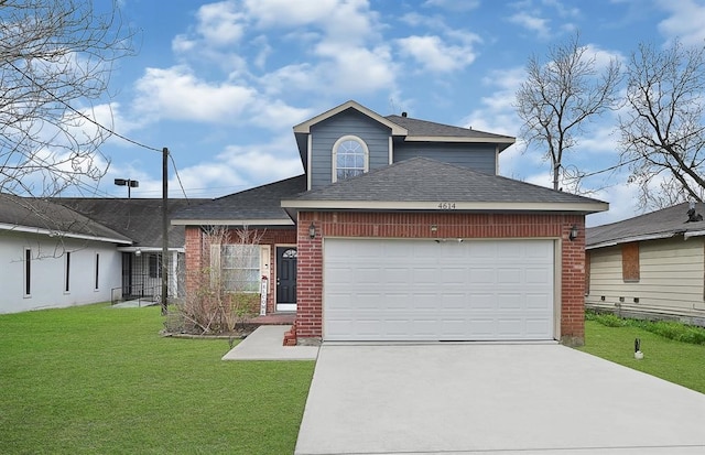 view of front of house with a garage and a front yard