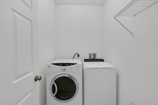 laundry area featuring independent washer and dryer