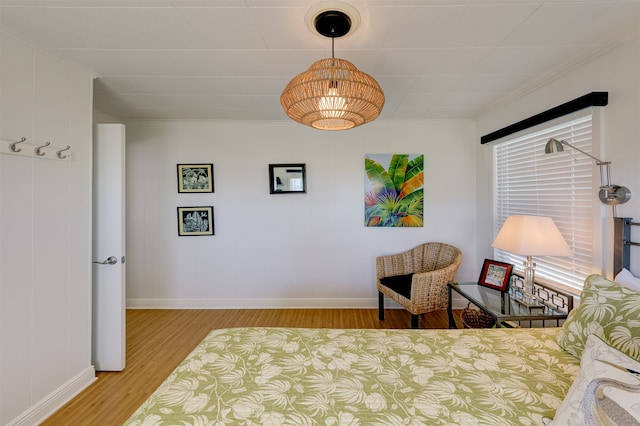 bedroom with light wood-type flooring