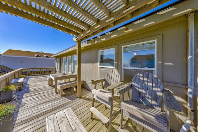 wooden deck featuring a pergola