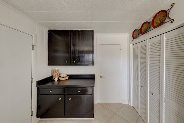 kitchen featuring light tile patterned flooring