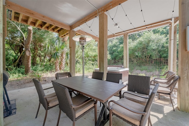 view of patio featuring a hot tub