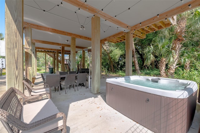 view of patio / terrace featuring a hot tub